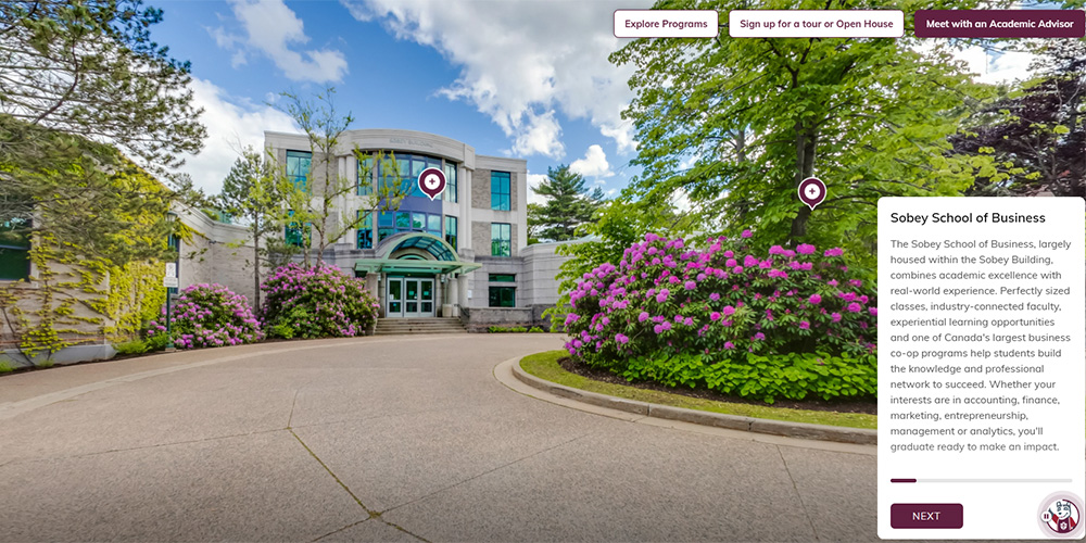 The Sobey School of Business Building with flowers blooming outside.